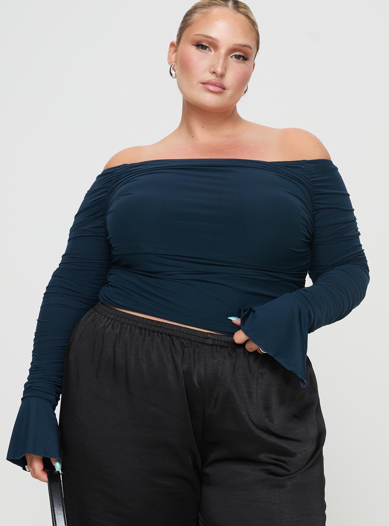 front view of model wearing Princess Polly Moreno Off The Shoulder Top Navy Curve Full Sleeves straight 