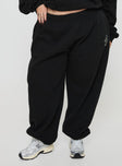Black Track pants Relaxed fit, elasticated waist and cuffs, twin hip pockets