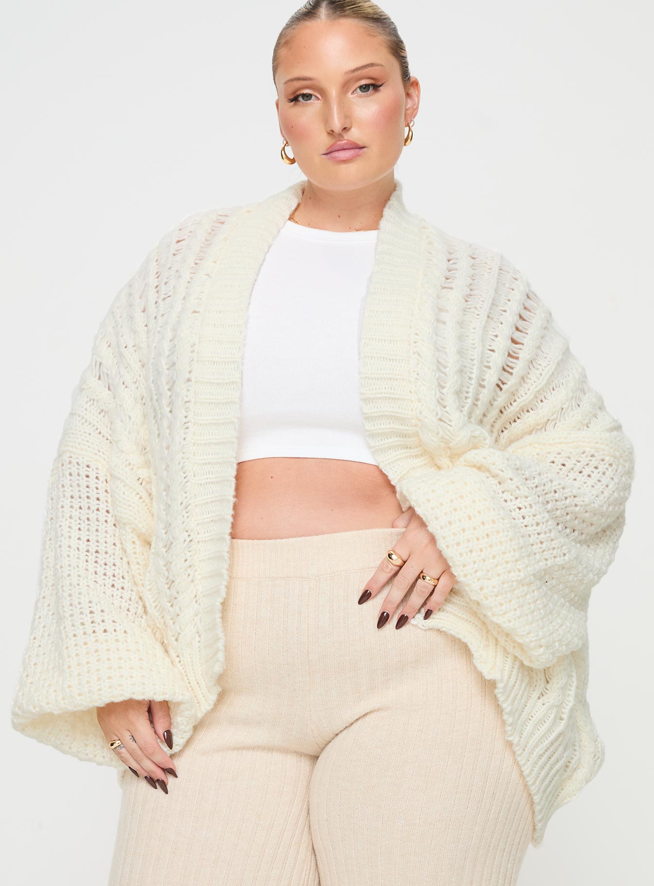 front view of model wearing Princess Polly Abner Cable Cardigan Cream Curve 