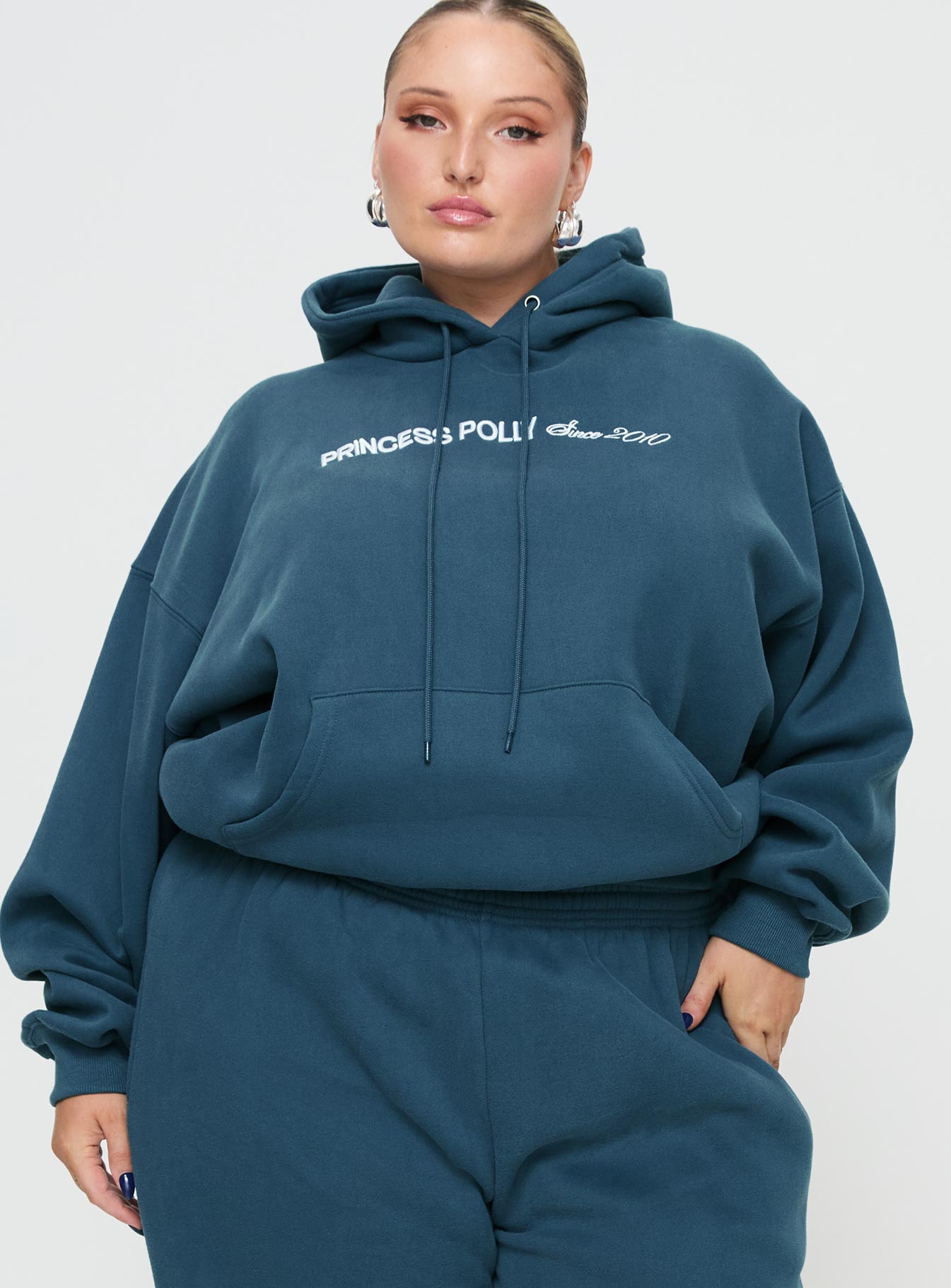 Princess polly hooded sweatshirt block / cursive text slate curve