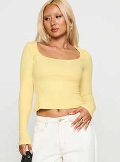 front view of model wearing Princess Polly Baseline Long Sleeve Top Yellow Full Sleeves Scoop Neck 