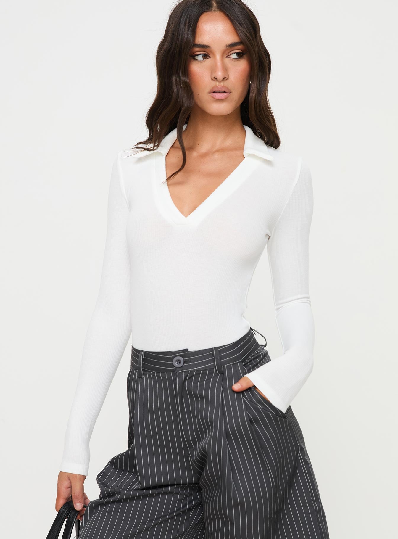 back view of model wearing Princess Polly Tarpley Long Sleeve Bodysuit White Full Sleeves 