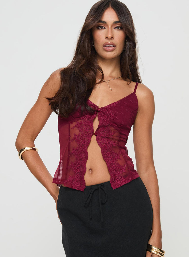 Cami top V neckline, adjustable straps, lace trim detail, button fastening at front, split hem Good stretch, lined bust, sheer Princess Polly Lower Impact 
