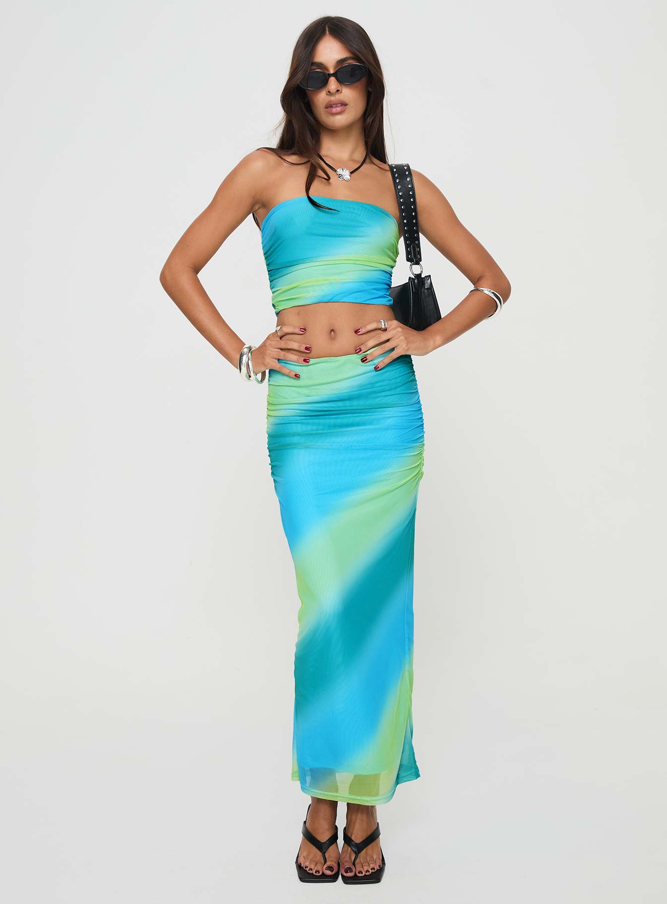 Two piece mesh set Tube top, ruched sides, inner silicone strip at bust Maxi skirt, thin elasticated waistband, ruching down sides Good stretch, fully lined