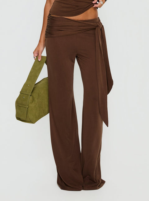 back view of model wearing Princess Polly Katiana Wrap Jersey Pants Brown Mid Rise Pants 