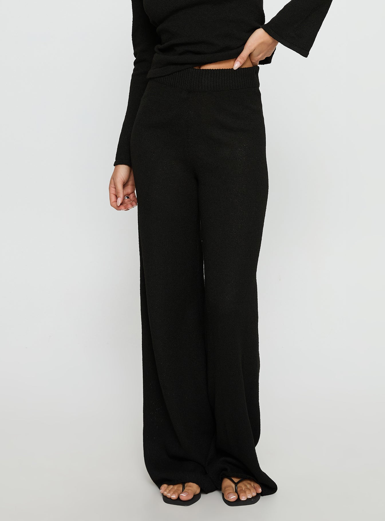 front view of model wearing Princess Polly Jaede Knit Pants Black High Rise Pants 