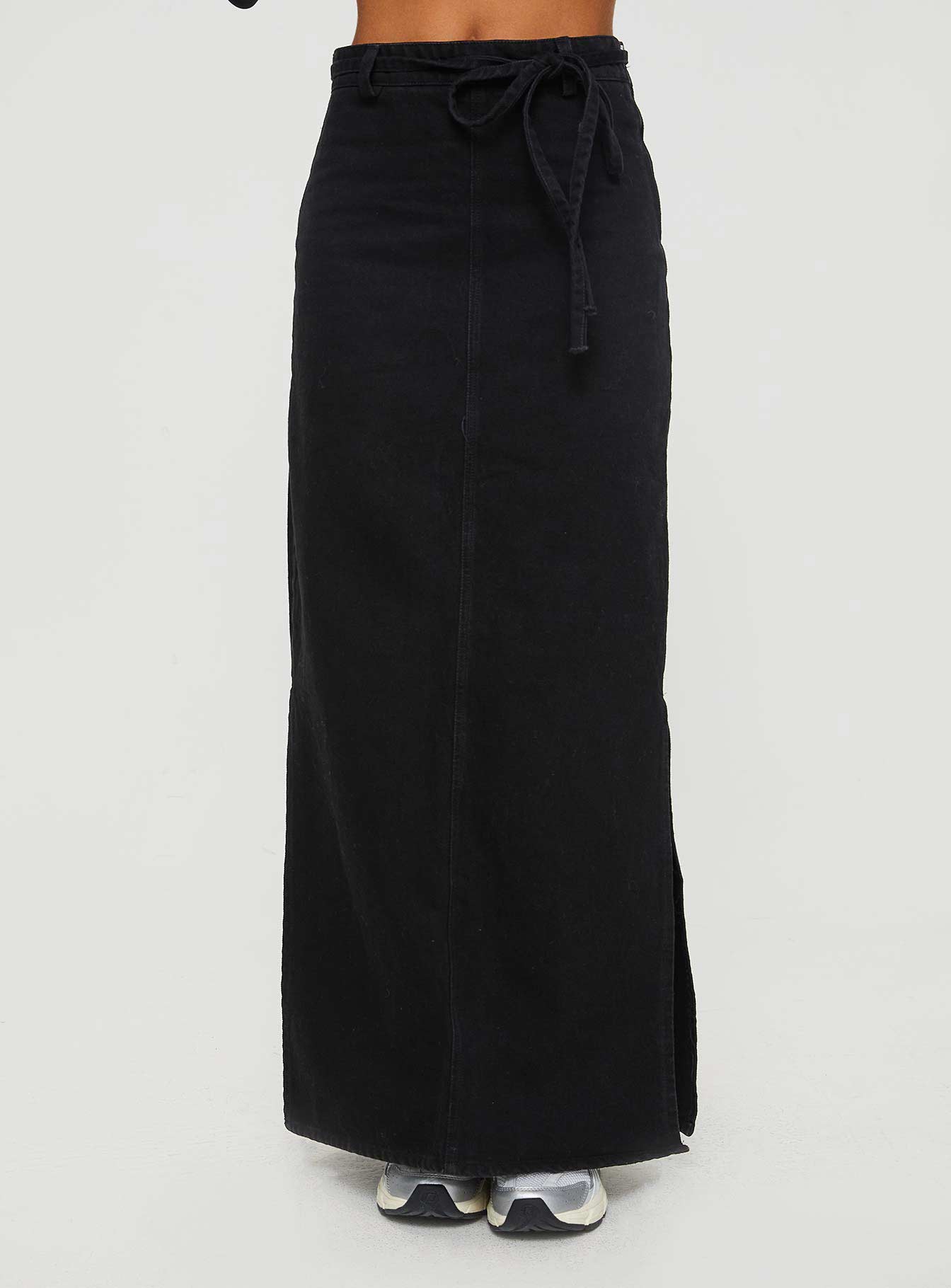   side view of model wearing Princess Polly Brandee Tie Front Denim Maxi Skirt Black Wash Maxi 