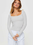 Long sleeve ribbed top with a scooped neckline Good stretch, lined body