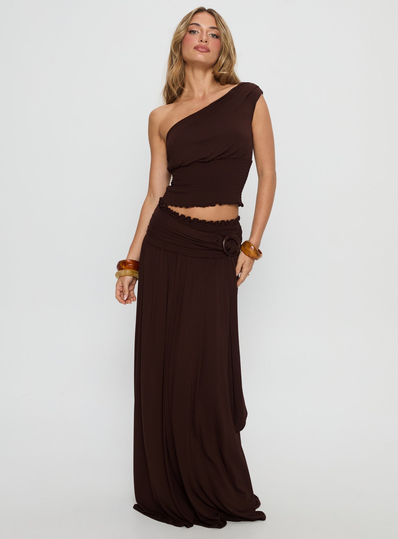   front view of model wearing Princess Polly Full Orbit Shirred Maxi Skirt Chocolate Brown Maxi Skirts 