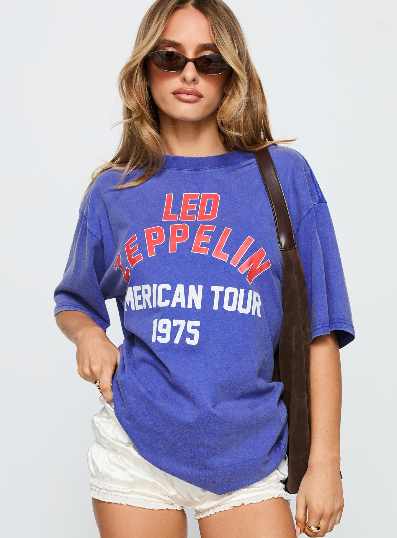 front view of model wearing Princess Polly Led Zeppelin Vintage Oversized Graphic Tee Blue Half Sleeves Crew Neck 