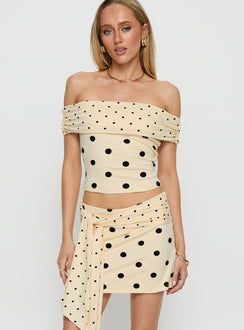  front view of model wearing Princess Polly Porzia Wrap Detail Mini Skirt Cream / Polka Dot Mini Skirts 