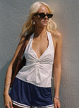 side view of model wearing Princess Polly Millbank Top White Sleeveless Plunger 