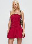 side view of model wearing Princess Polly Glamour Girl Strapless Bubble Hem Mini Dress Red Straight Neck 