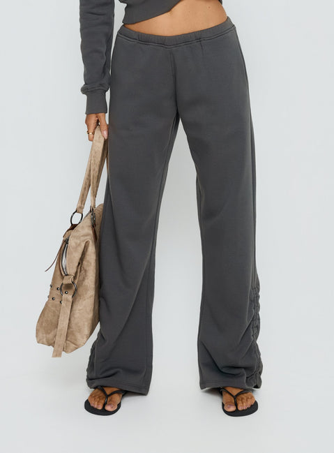 back view of model wearing Princess Polly Rylan Low Rise Joggers Grey Low Rise Pants 