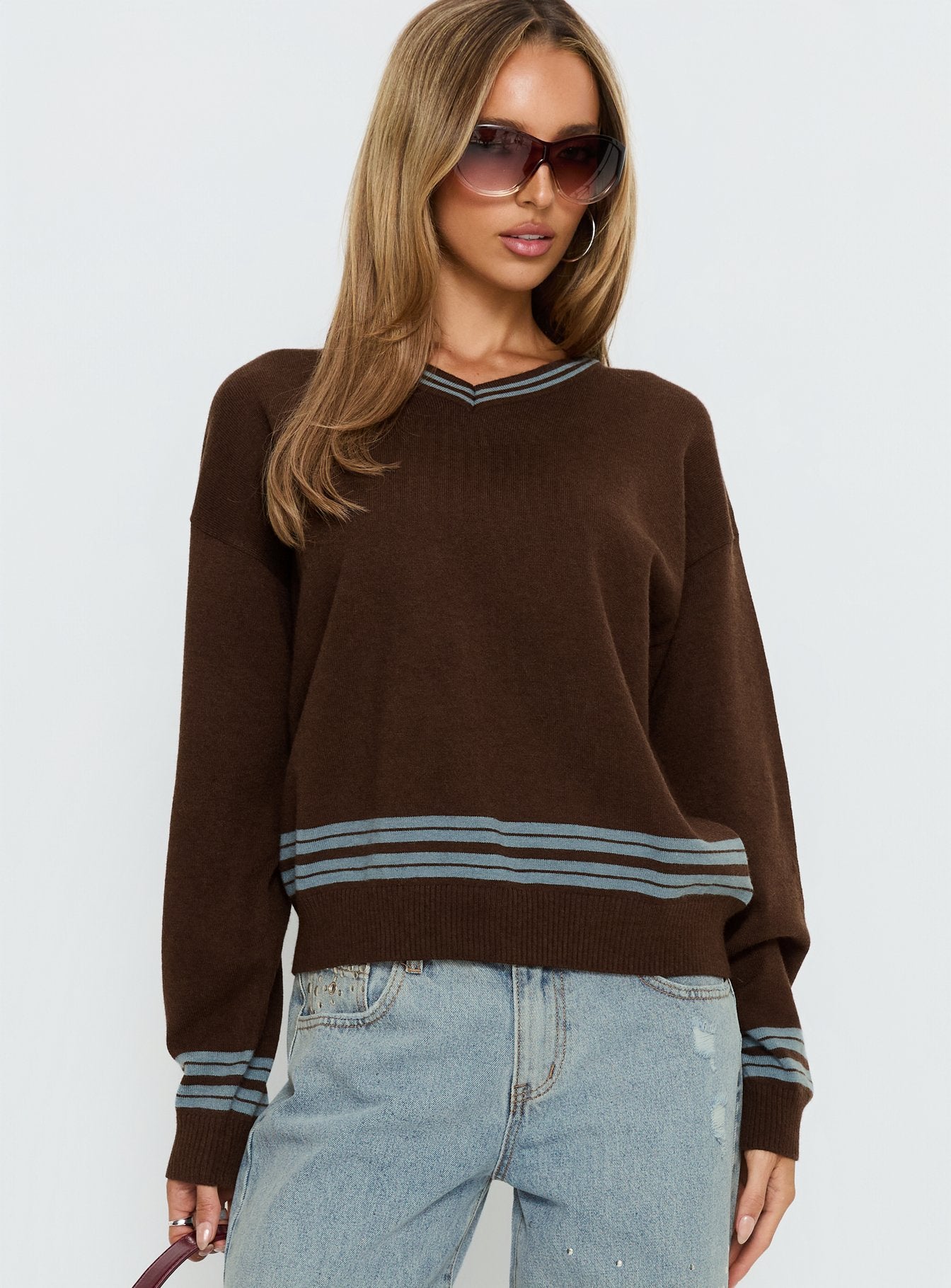 front view of model wearing Princess Polly Yarnia V Neck Jumper Brown / Blue regular 