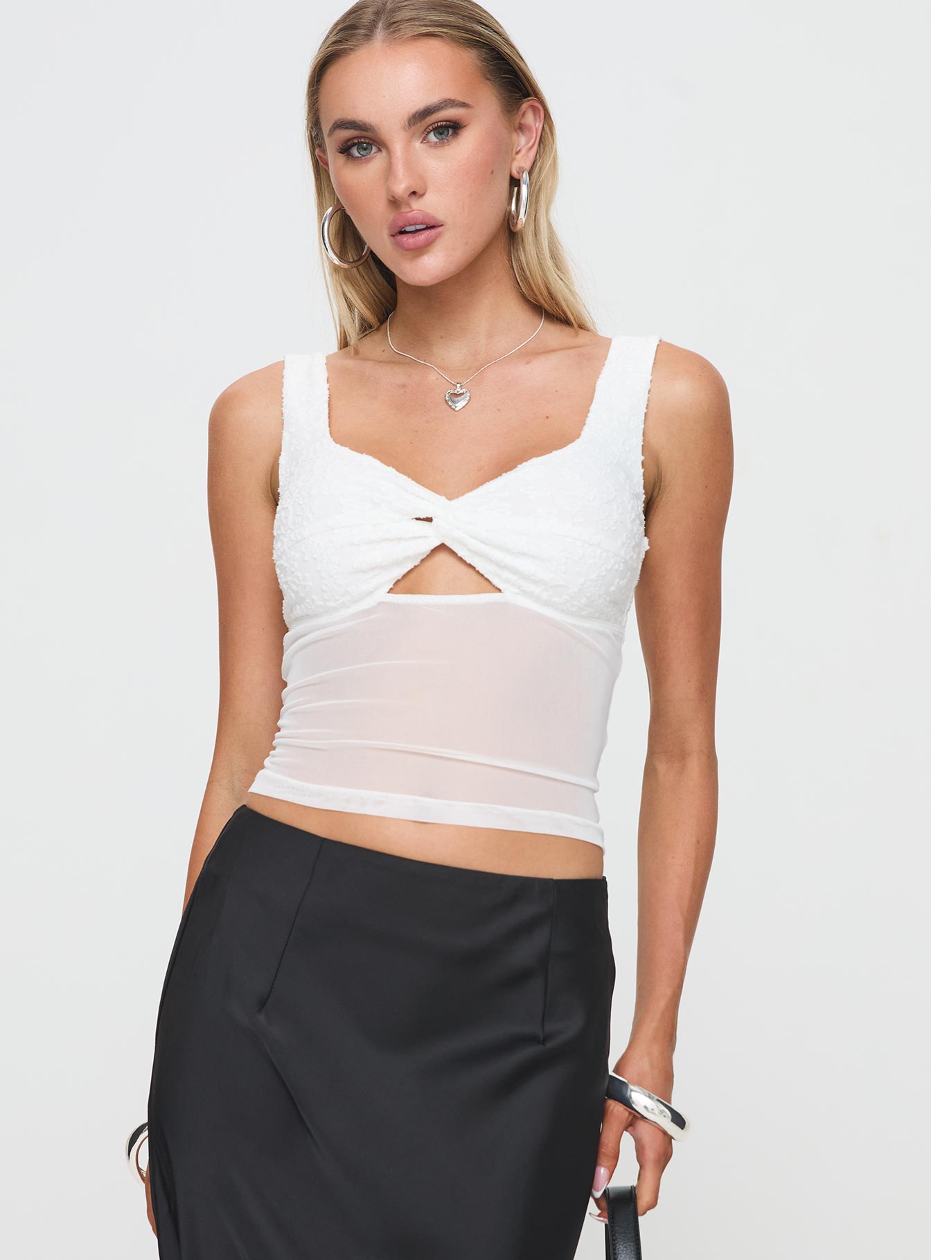 front view of model wearing Princess Polly Gita Top White Sleeveless Sweetheart 