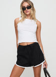 front view of model wearing Princess Polly Tyrah Shorts Black High Waisted Shorts 