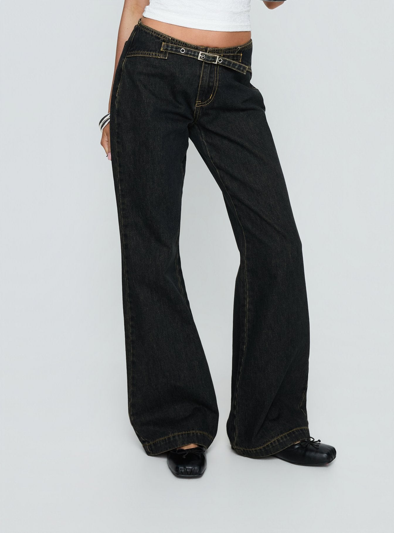 back view of model wearing Princess Polly Slow Ride Mid Rise Bootleg Belted Jeans Grunge Wash Mid Rise Jeans 