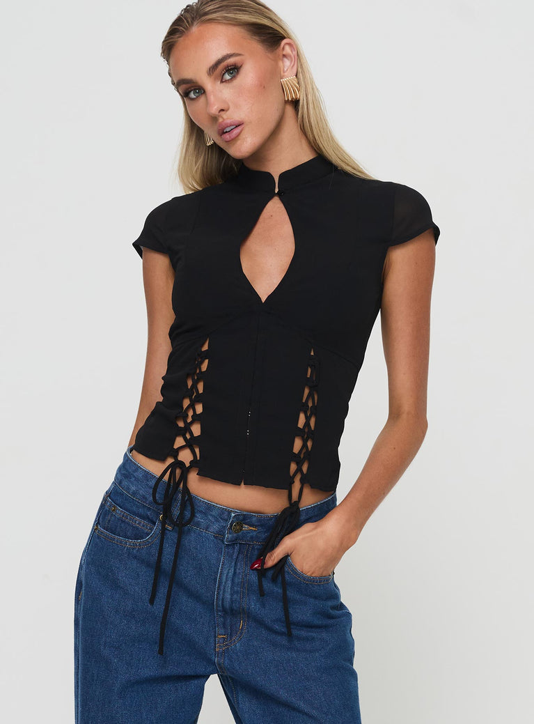 Top Sheer material, mandarin collar with button fastening, cap sleeves, four splits at hem front and back with lace-up fastening, cut-out detail at bust, hook & eye fastening down front Non-stretch, lined bust  Princess Polly Lower Impact 