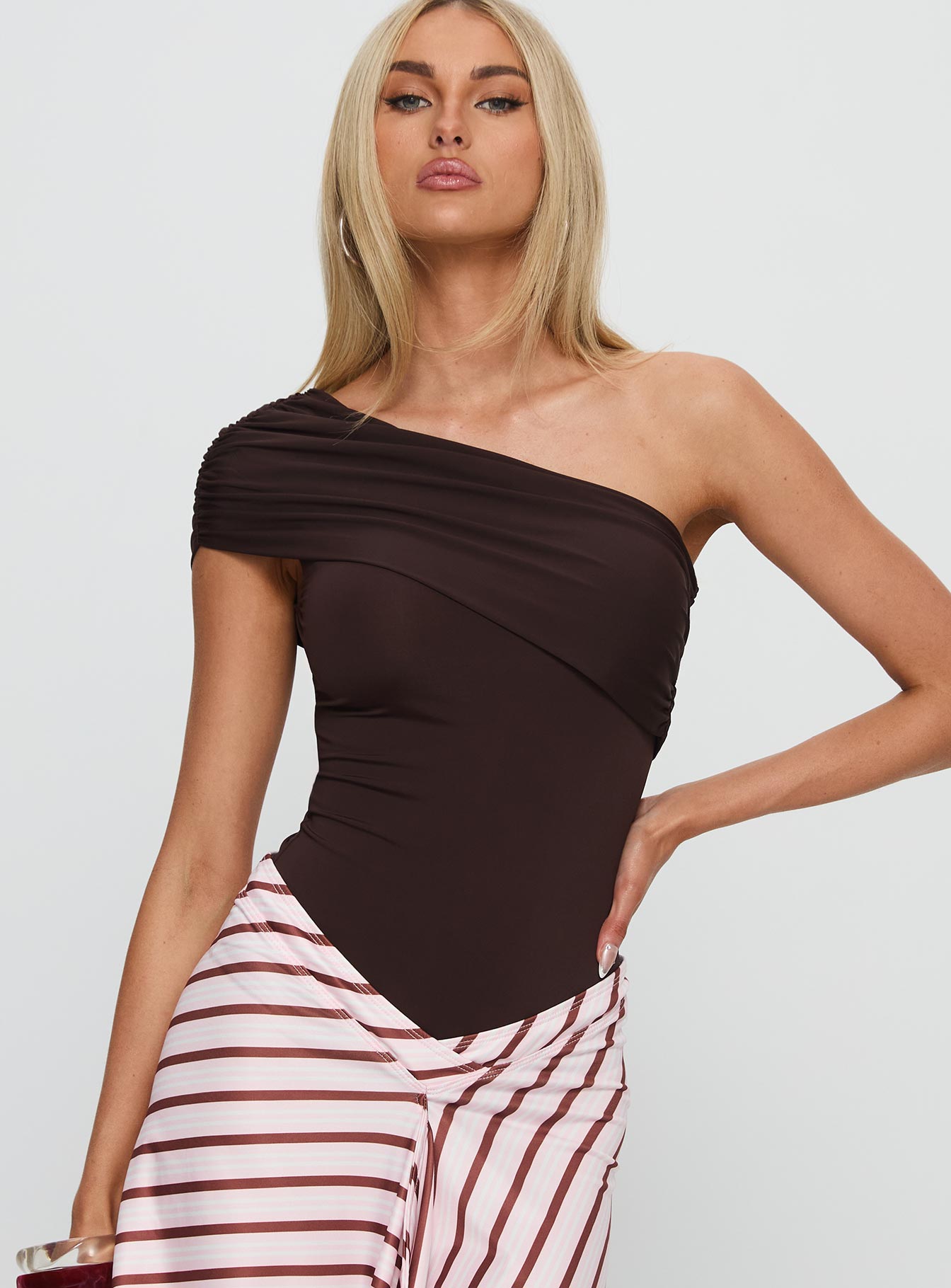 front view of model wearing Princess Polly Celyra One Shoulder Bodysuit Chocolate Sleeveless 