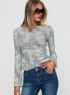 side view of model wearing Princess Polly Let It Happen Boat Neck Long Sleeve Top Leopard Full Sleeves Boat Neck 