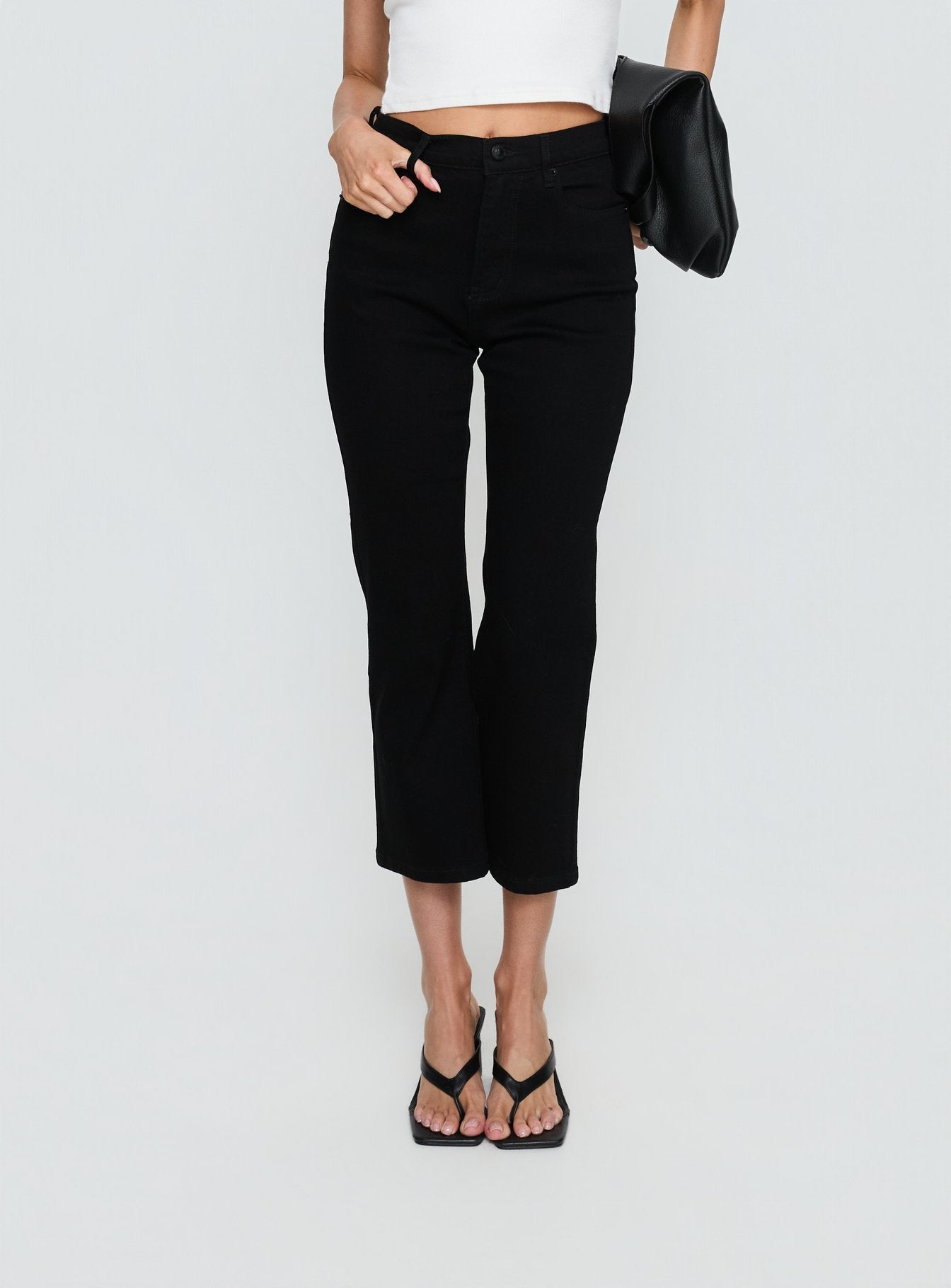 back view of model wearing Princess Polly Cindee High Rise Cropped Jeans Jet Black High Rise Jeans 
