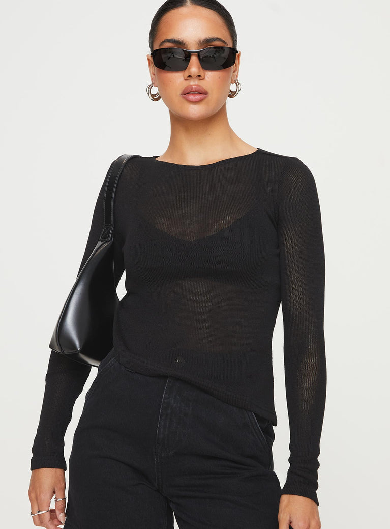 Long sleeve knit top with asymmetric hem Good stretch, unlined