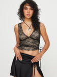 Top V-neckline, sheer lace material, ruching at side with adjustable ties Invisible zip fastening at side