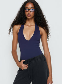 front view of model wearing Princess Polly Someone New Halter Bodysuit Navy Sleeveless 