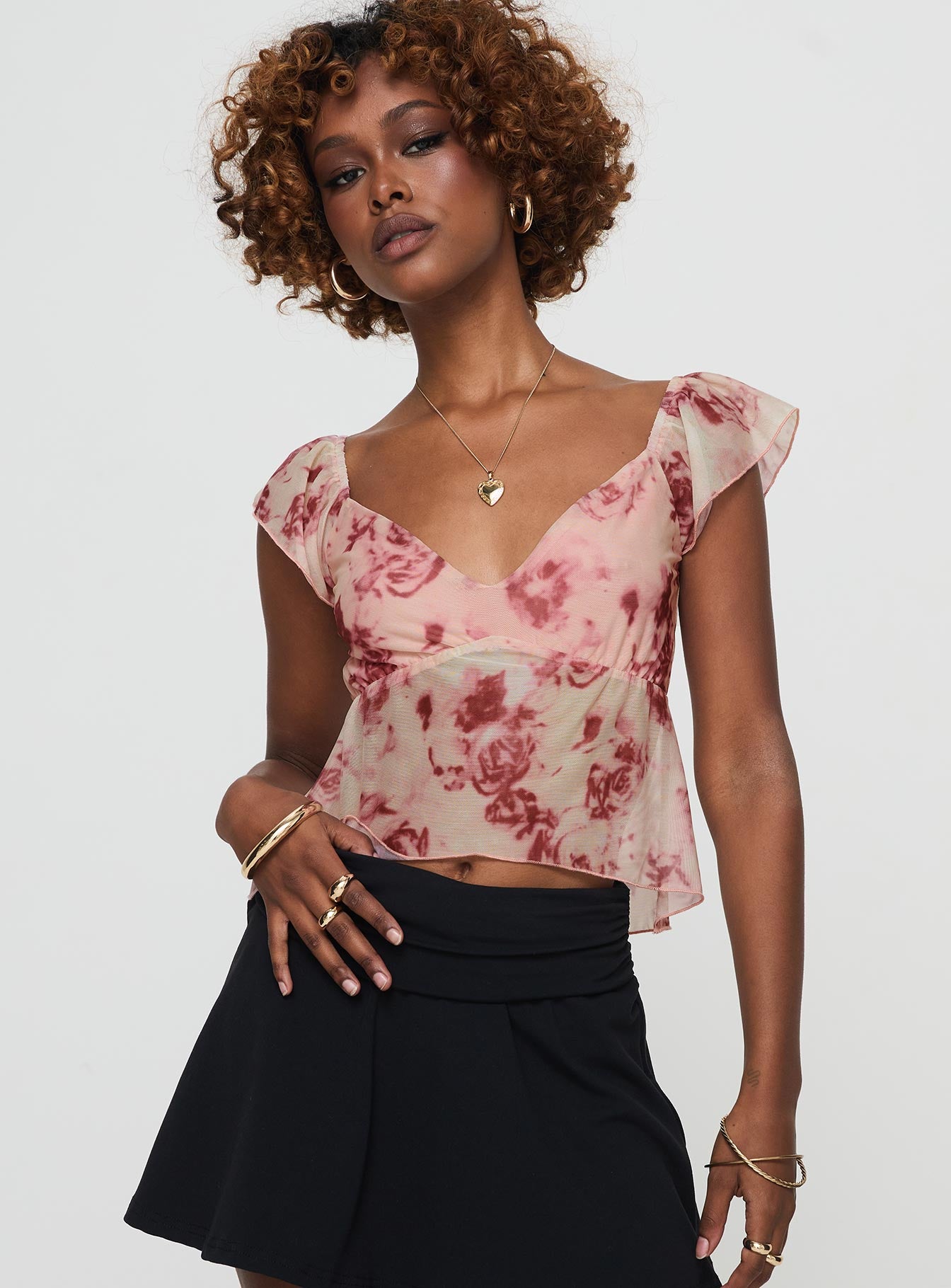 front view of model wearing Princess Polly Time After Top Pink Floral Short Sleeves V-Neck 