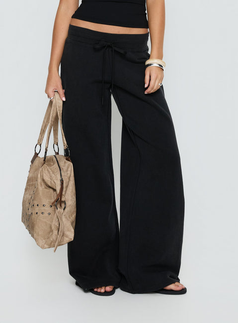 front view of model wearing Princess Polly Dodie Wide Leg Pants Washed Black Mid Rise Pants 