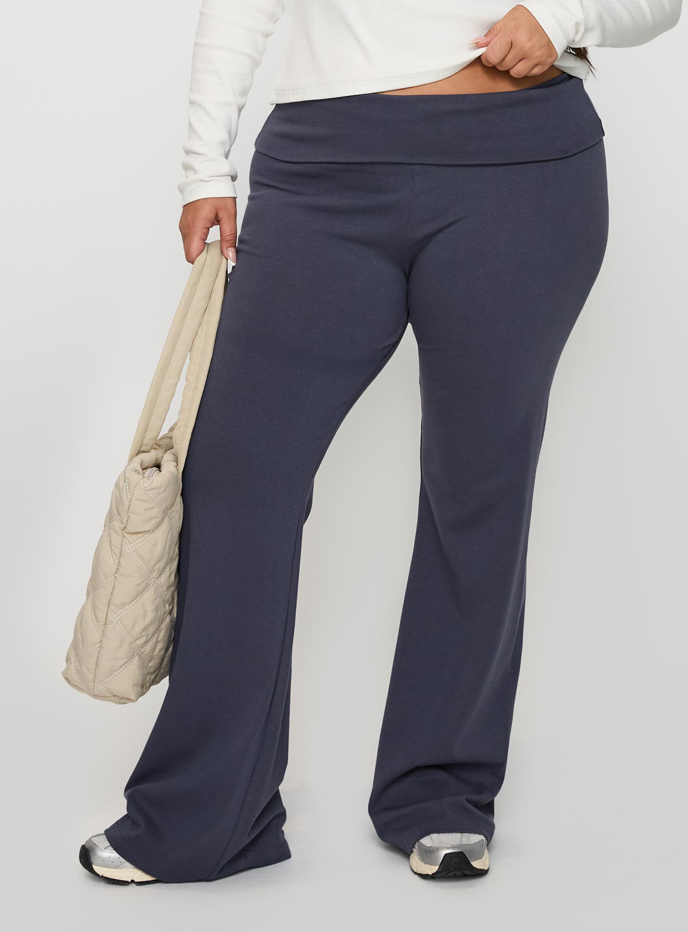 side view of model wearing Princess Polly Movement Yoga Pant Blue Curve 