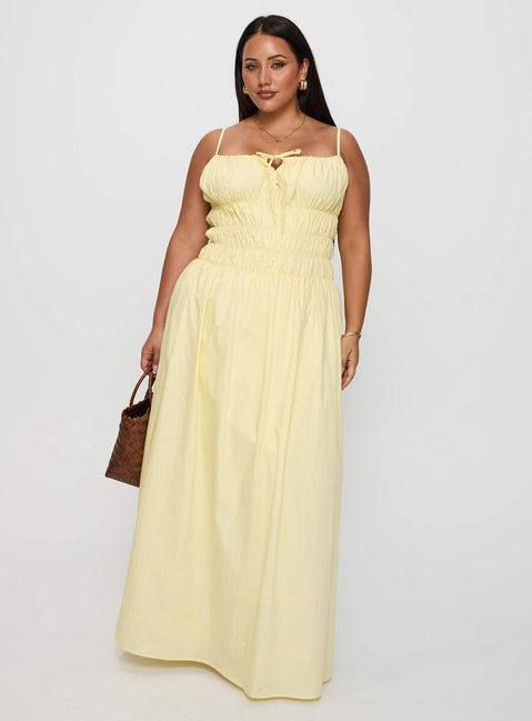 side view of model wearing Princess Polly Loralei Shirred Maxi Dress Yellow Curve Square Neck 