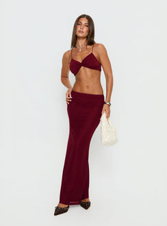   side view of model wearing Princess Polly Delores Ruched Maxi Skirt Red Maxi Skirts 