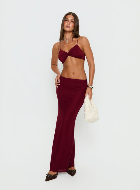   side view of model wearing Princess Polly Delores Ruched Maxi Skirt Red Maxi Skirts 