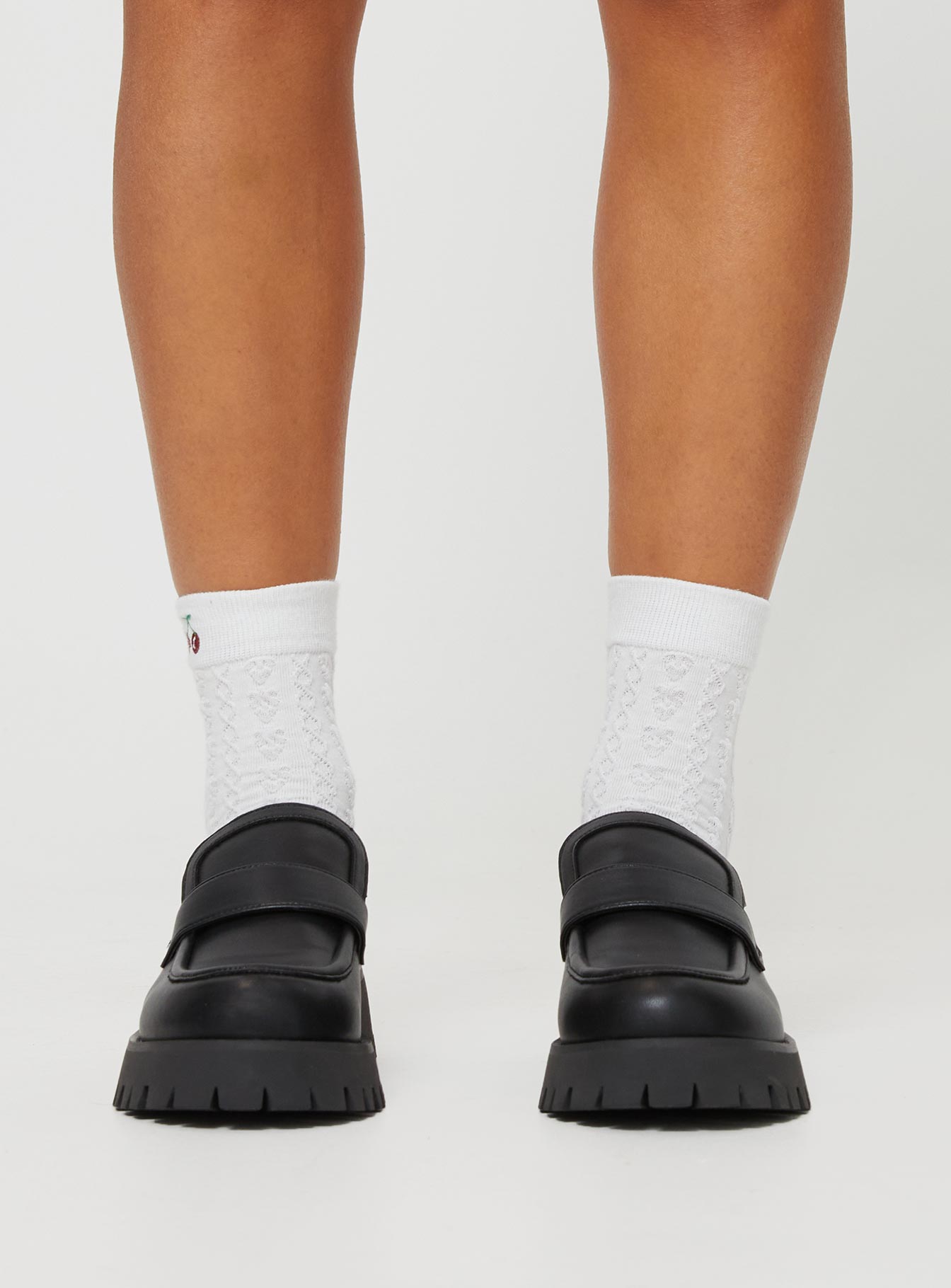 Faux leather platform loafers Slip-on design, padded footbed, treaded sole, rounded toe