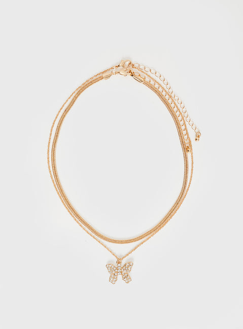 Gold-toned necklace Two separate chains, large charm with diamante detail, lobster clasp fastening