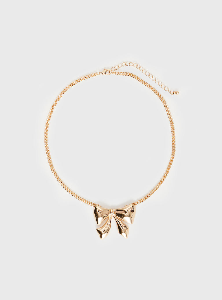 Gold-toned necklace Bow charm, lobster clasp fastening