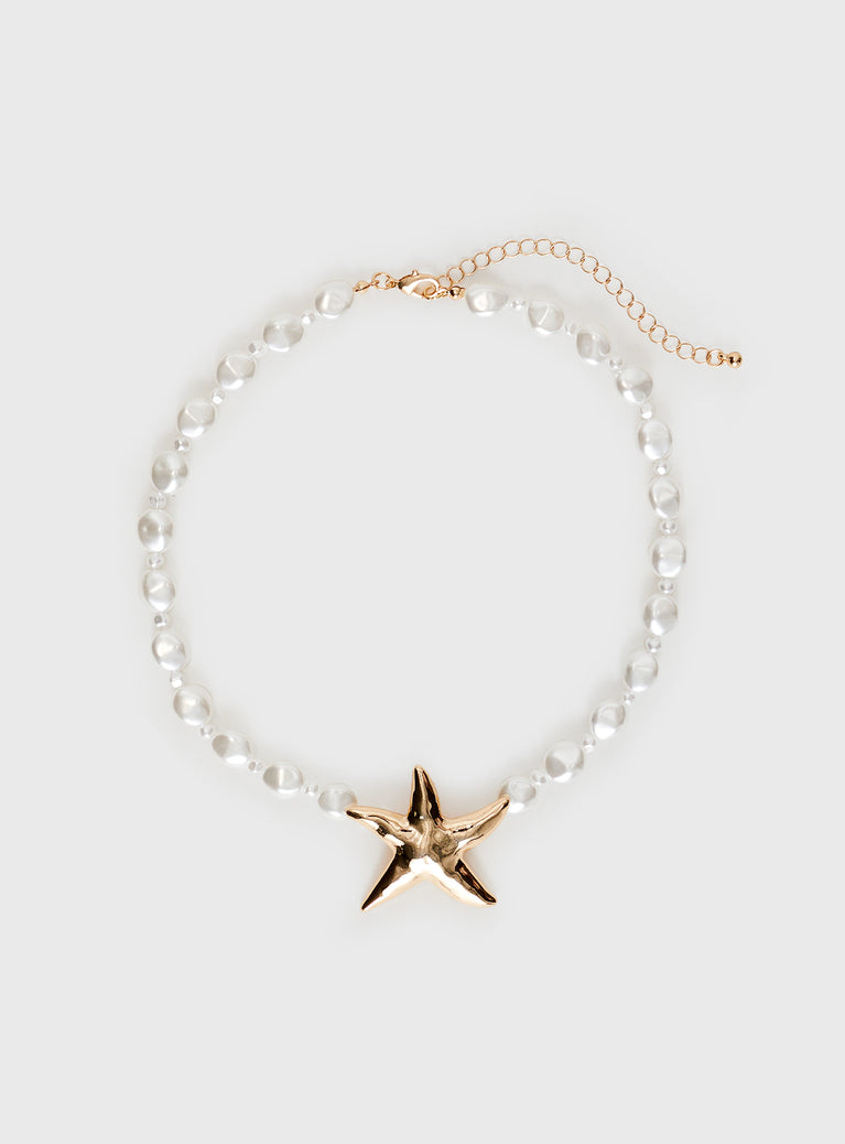 Necklace Beaded pear design, gold-toned star detail, lobster clasp fastening