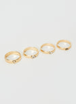 Ring pack Gold toned, four pack, gem detail