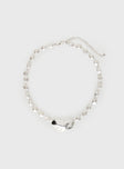 Silver-toned necklace Pearl detail, large pendant, lobster clasp fastening