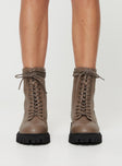 Faux leather boot Lace up fastening, rounded toe, pull tab at back, platform base, padded footbed