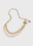 Gold-toned chain belt Layered design, sun pendants, lobster clasp fastening