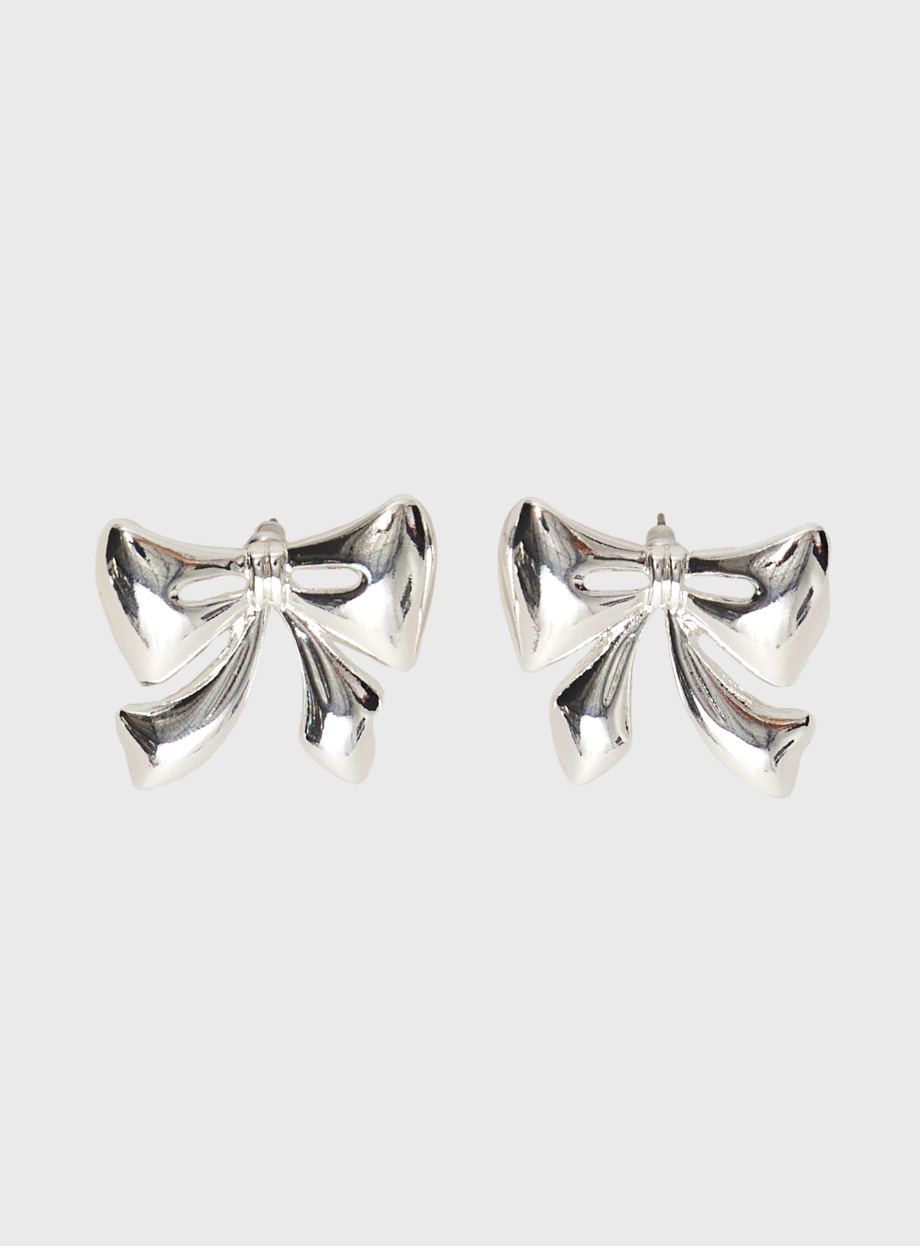 Make Believe Bow Earrings Silver