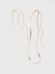 Gold-toned chain belt Two separate chains, pearl detail, lobster clasp fastening