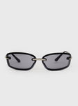 Sunglasses  Wrap style, metal frame with moulded nose bridge, grey tinted lenses