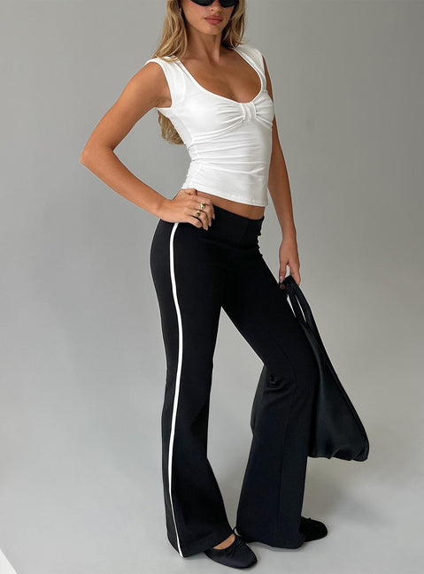 front view of model wearing Princess Polly Simki Jersey Flare Pants Black Low Rise Pants 