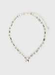 Silver-toned necklace Diamonte-like detail, drop charm, lobster clasp fastening 