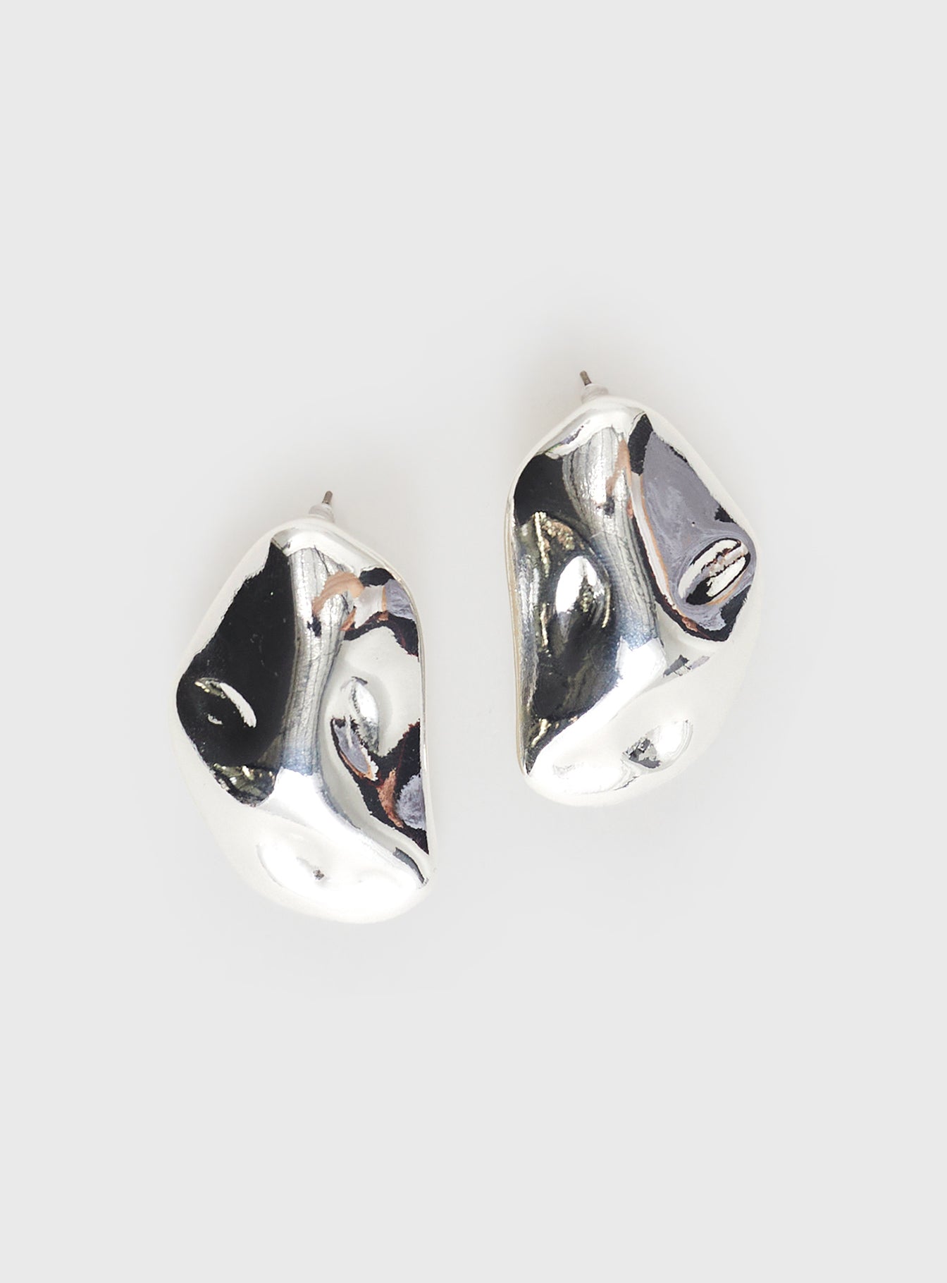 Silver toned earrings Stud fastening, lightweight