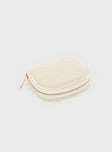 Coin purse  Fluffy outer material, four x card inserts, one middle zip compartment, extra padding sturdy outer